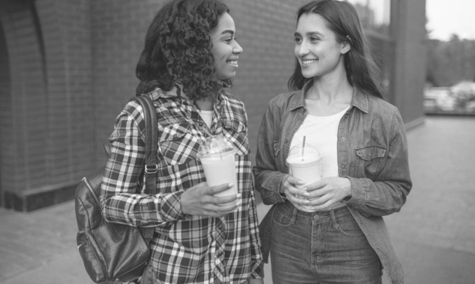 Student reviewing financial documents and taking notes